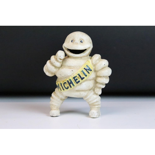 128 - Advertising - A cast iron Michelin man figure, marked 'Reg. 67548 Detroit' to reverse (approx 15cm h... 