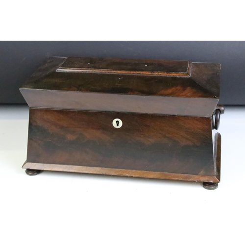 149 - William IV mahogany sarcophagus tea caddy, with twin loop handles, the lid opening to a pair of remo... 