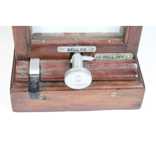 157 - Railwayana - A Mid 20th C mahogany cased lamp repeater, with bell on/off switch. Measures approx 25c... 