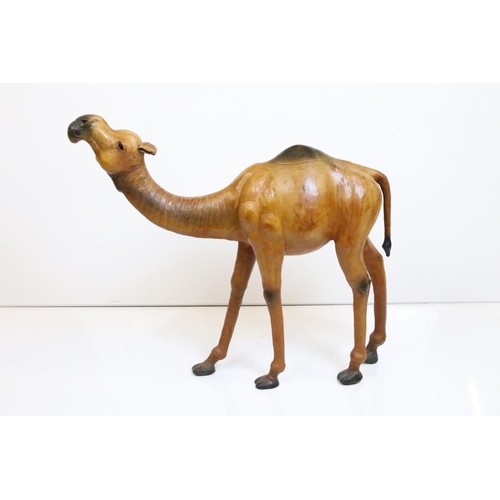 155 - Large leather dromedary (one-humped) camel with glass eyes. Measures 65cm x 71cm long.