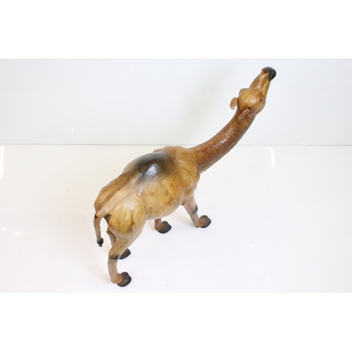 155 - Large leather dromedary (one-humped) camel with glass eyes. Measures 65cm x 71cm long.