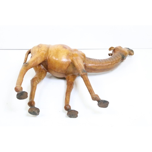 155 - Large leather dromedary (one-humped) camel with glass eyes. Measures 65cm x 71cm long.