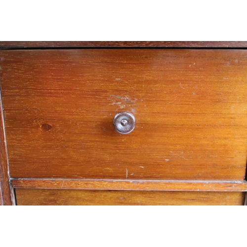 161 - Early 20th century mahogany smokers cabinet, the doors opening to three drawers, pipe rack to top. M... 