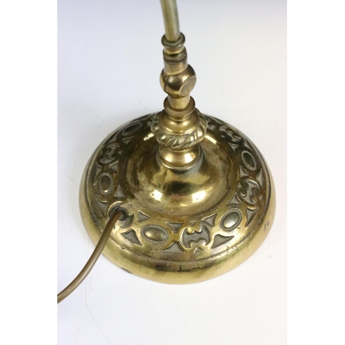 170 - A brass desk / bankers lamp with amber glass shade.