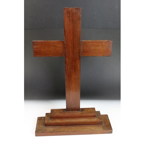 174 - Wooden cross mounted on a stepped base, 59cm high