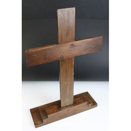 174 - Wooden cross mounted on a stepped base, 59cm high