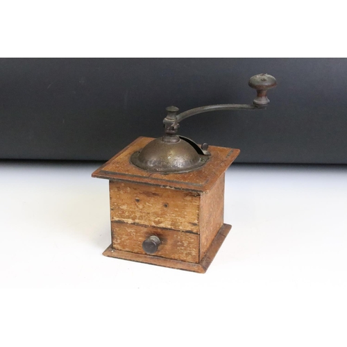 175 - An antique coffee grinder set within wooden case with lower coffee drawer.