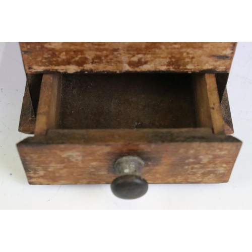 175 - An antique coffee grinder set within wooden case with lower coffee drawer.