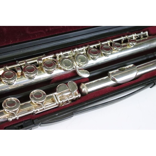 177 - A Yamaha flute contained within original protective case together with a cleaning brush.