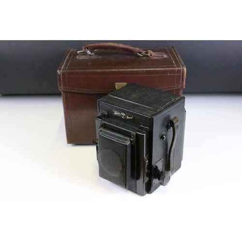 192 - A early to mid 20th century large format camera together with lens, filters...etc and stored within ... 