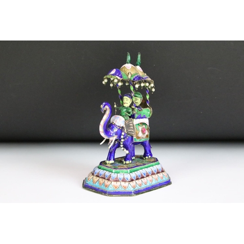 193 - An Indian white metal and enamel ornamental elephant with seed pearl decoration, stands approx 13cm ... 