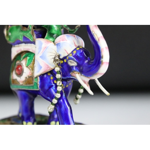 193 - An Indian white metal and enamel ornamental elephant with seed pearl decoration, stands approx 13cm ... 