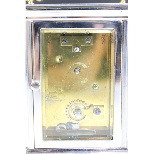 196 - An late 19th / early 20th century carriage clock, brassed cased with nickel plating, beveled glass p... 