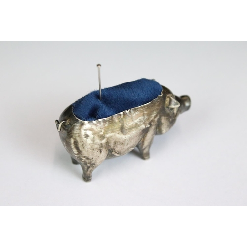 197 - A fully hallmarked sterling silver pin cushion in the form of a pig, assay marked for Birmingham and... 