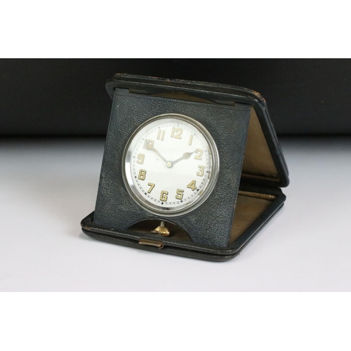 205 - A small group of mixed collectables to include a cased stud set, an 8-day travel clock and a 9ct gol... 