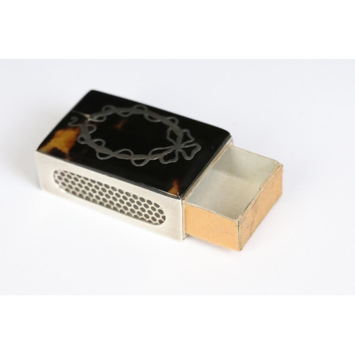 208 - A fully hallmarked sterling silver matchbox holder with faux tortoiseshell and silver inlay to the t... 