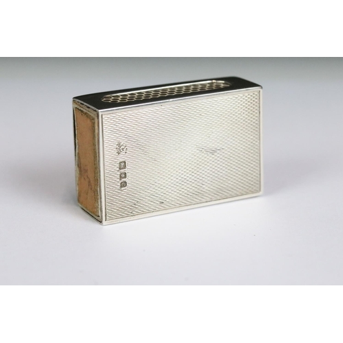 208 - A fully hallmarked sterling silver matchbox holder with faux tortoiseshell and silver inlay to the t... 