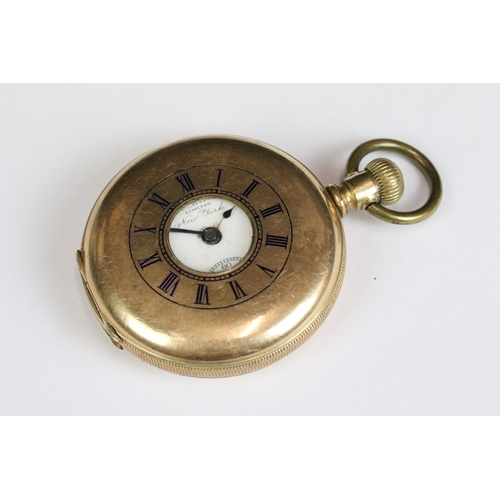 211 - A early 20th century 14k gold plated half hunter pocket watch.