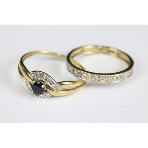 214 - A ladies 9ct gold and sapphire dress ring together with a yellow metal eternity ring.