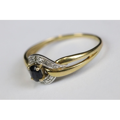 214 - A ladies 9ct gold and sapphire dress ring together with a yellow metal eternity ring.