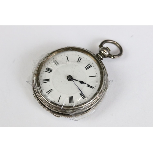 221 - A collection of three silver cased ladies fob watches, two with enamel decoration to the dial.