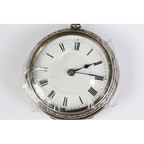 221 - A collection of three silver cased ladies fob watches, two with enamel decoration to the dial.