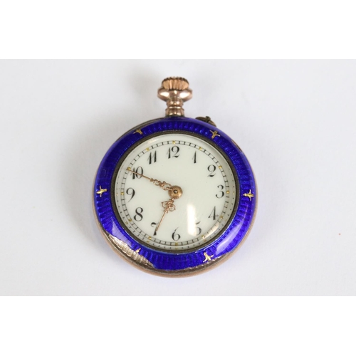 224 - An antique ladies yellow metal fob watch with enamel and gilt decoration.