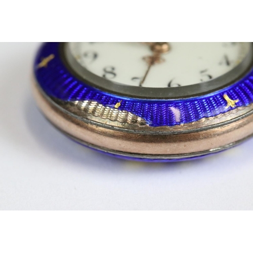 224 - An antique ladies yellow metal fob watch with enamel and gilt decoration.