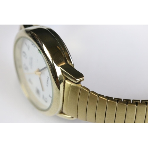 225 - A small collection of four gents and ladies wristwatches to include a 9ct gold cased gents Timor exa... 