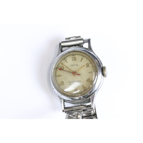 225 - A small collection of four gents and ladies wristwatches to include a 9ct gold cased gents Timor exa... 