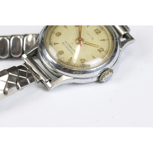 225 - A small collection of four gents and ladies wristwatches to include a 9ct gold cased gents Timor exa... 