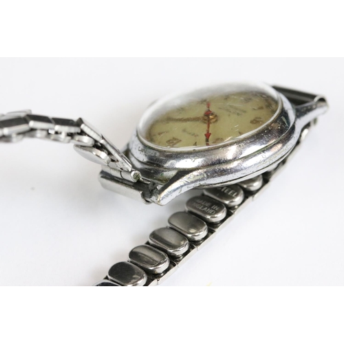 225 - A small collection of four gents and ladies wristwatches to include a 9ct gold cased gents Timor exa... 