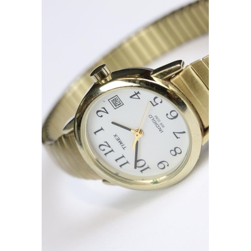 225 - A small collection of four gents and ladies wristwatches to include a 9ct gold cased gents Timor exa... 