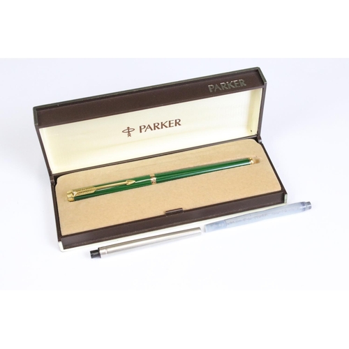 229 - A collection of three Parker pens to include a fountain pen together with a group of four autographs... 