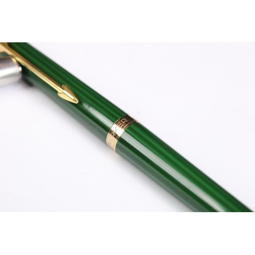 229 - A collection of three Parker pens to include a fountain pen together with a group of four autographs... 