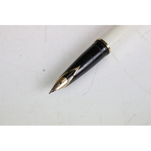 234 - A Sheaffer Special Limited Edition fountain pen with 14ct gold nib together with desk stand.