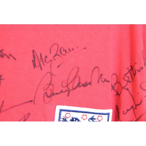 606 - England World Cup 1966 Classic Replica Shirt / Jersey signed by eleven members of the squad includin... 