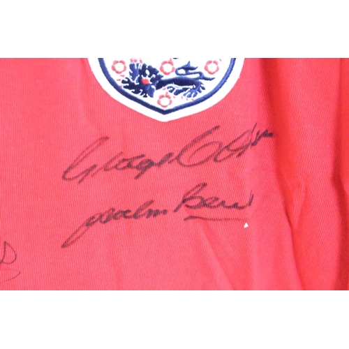 606 - England World Cup 1966 Classic Replica Shirt / Jersey signed by eleven members of the squad includin... 