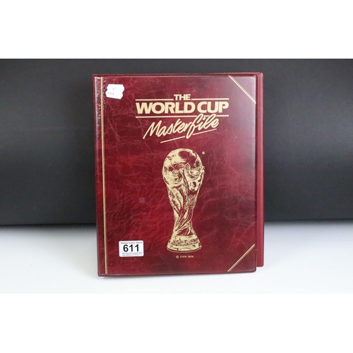 611 - ' The World Cup Masterfile ' Album with twenty four World Cup Football First Day Issues including an... 