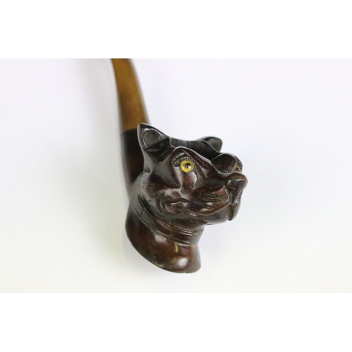 235 - Two novelty smokers pipes with bowls in the form of a bull and a dog