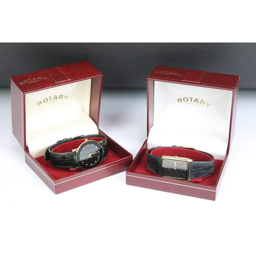 238 - Two gents quartz Rotary wristwatches, both with black dials and complete with display cases.