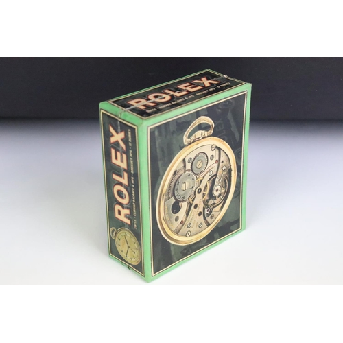 239 - A Rolex pocket watch box with advertising graphics to all sides.