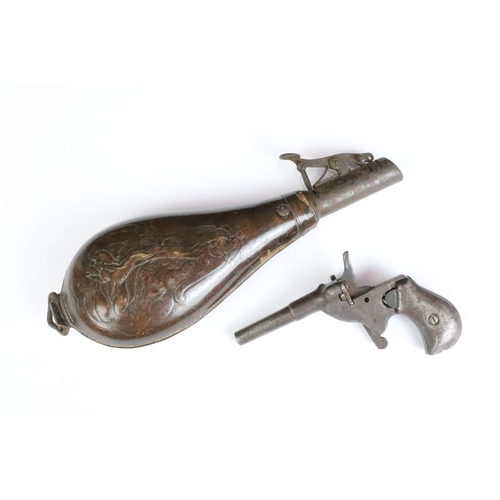 241 - An antique pistol together with a leather powder flask.