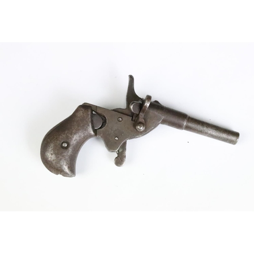 241 - An antique pistol together with a leather powder flask.