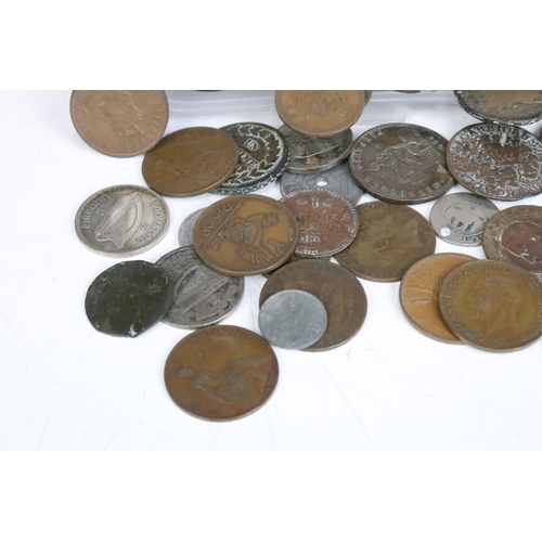 242 - A collection of British and foreign coins to include pre decimal silver and King George III examples... 