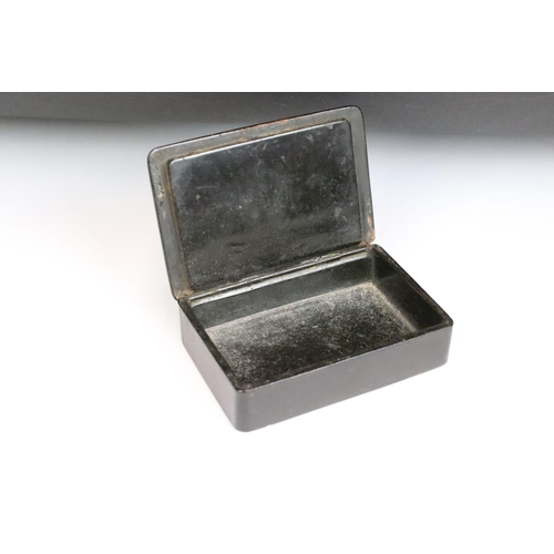 243 - An antique shagreen cigarette case together with three snuff / trinket boxes.