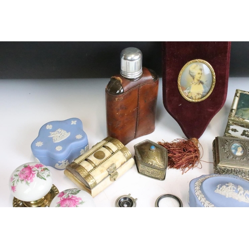 263 - A box of mixed collectables to include folding skeletal opera glasses, leather cased hip flask, cera... 