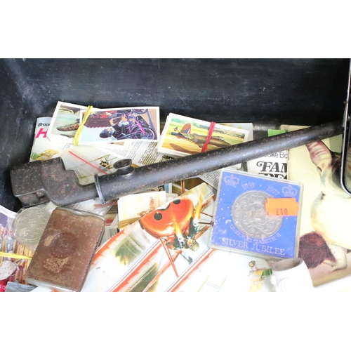 273 - A box of mixed collectables to include a Lee Enfield bayonet, lighter, pocket compass, tea cards, co... 