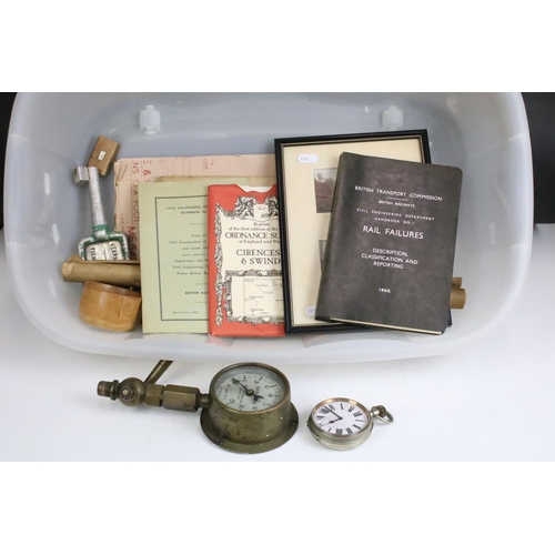 274 - A box of mixed collectables to include a Goliath pocket watch, brass pressure gauge and a quantity o... 