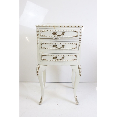 483 - Two French style Cream Painted Bedside Cabinets with moulded floral and foliate decoration, one with... 